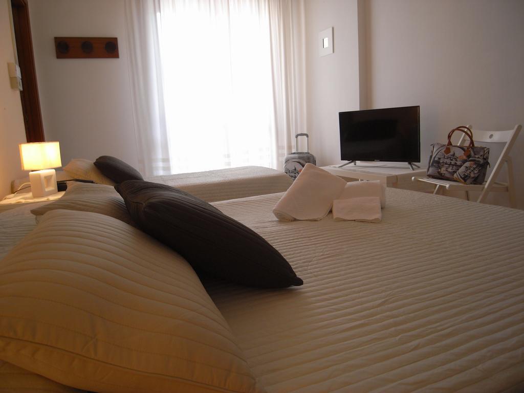 Hotel Moreri Grado Chambre photo