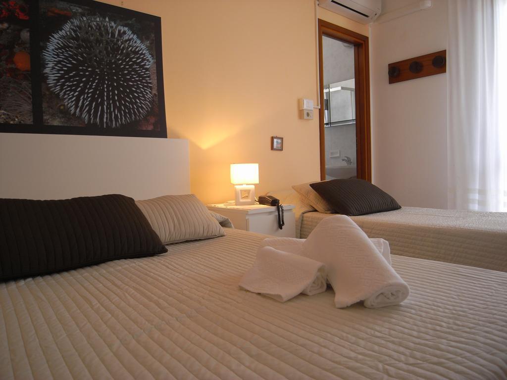 Hotel Moreri Grado Chambre photo